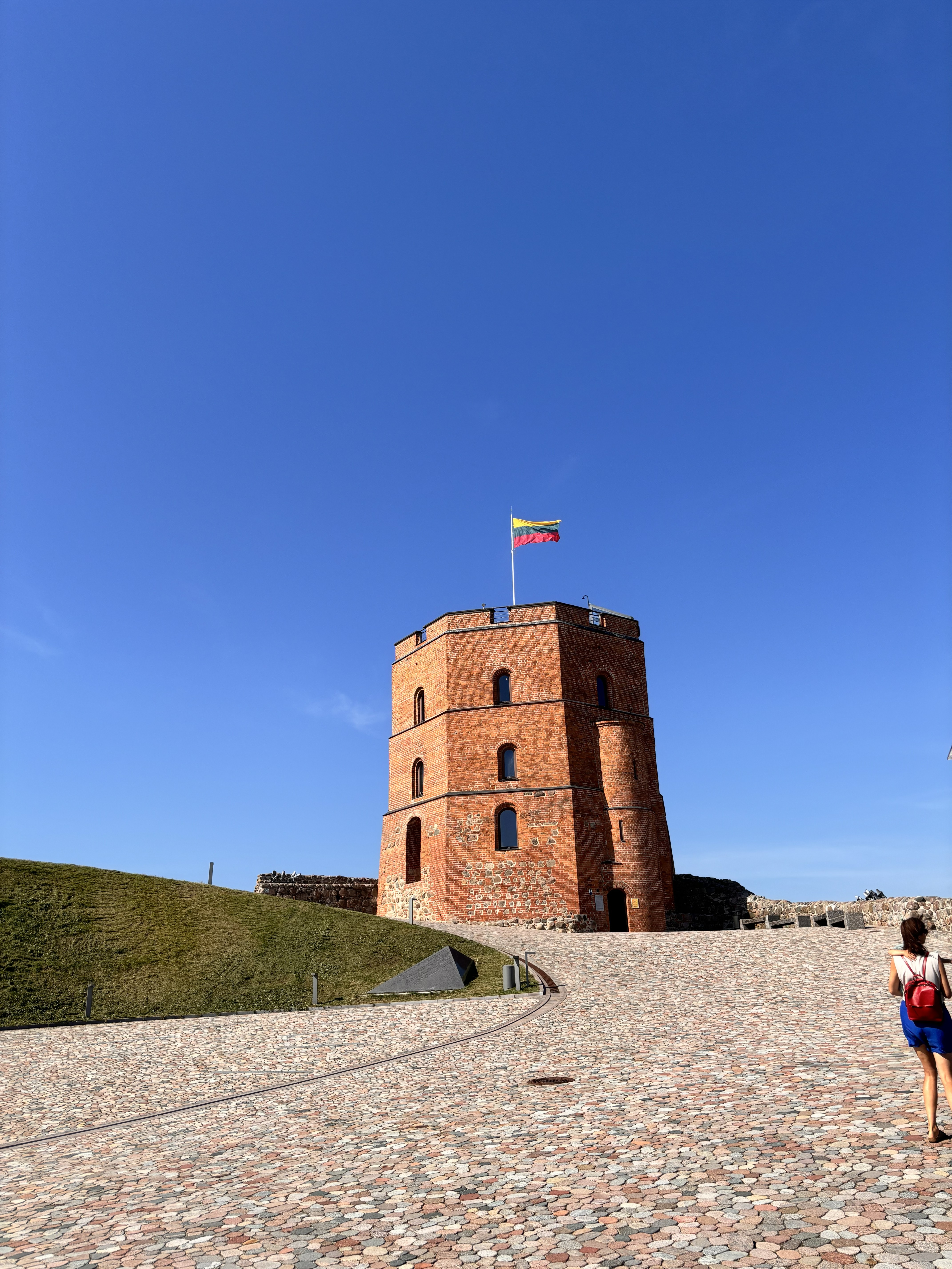 Gediminas' Tower under the clearest blue sky, making the whole climb feel immediately worth it.