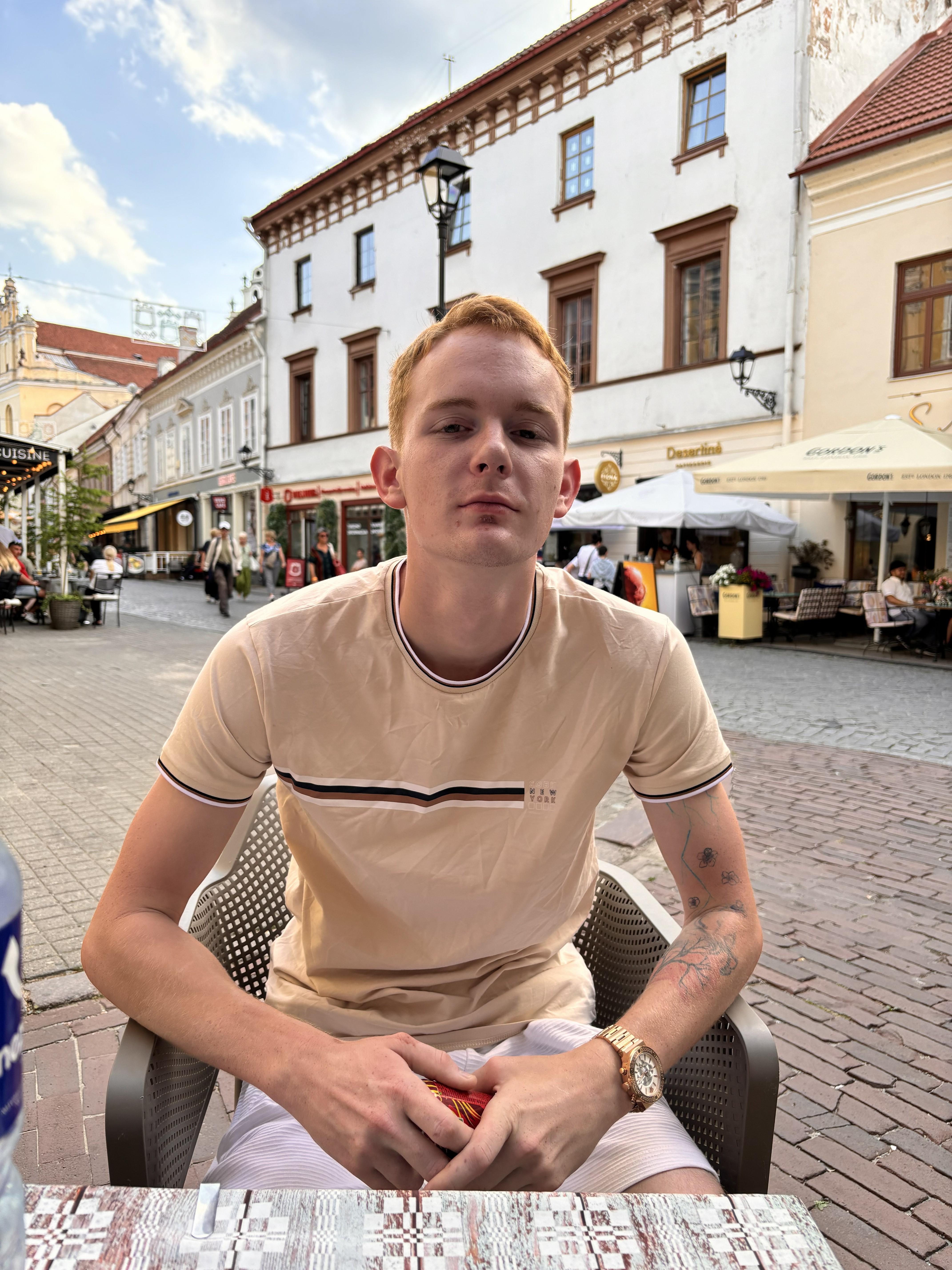 Aiden in Old Town, probably sitting still for the first time all day after I made him wander every pretty street I saw.